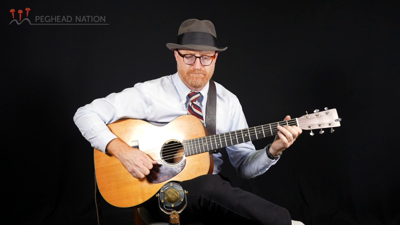 Flynn Cohen teaching his Irish Flatpicking Guitar course